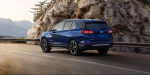 Blue 2022 Chevrolet Equinox Driving