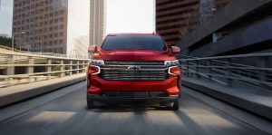 Red 2022 Chevrolet Tahoe Driving